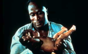 L'acteur John Amos dans Roots, en 1977.