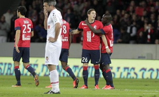 Nolan Roux fête son but lors du match entre Lille et Monaco le 3 novembre 2013.