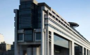 A picture taken with a tilt and shift lens shows Bercy Finance and Budget ministry, on March 15, 2013 in Paris. AFP PHOTO / FRED DUFOUR