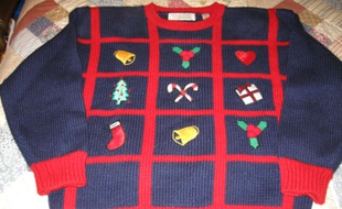 Un superbe pull de Noël, idéal à porter au bureau pour détendre tout le monde.