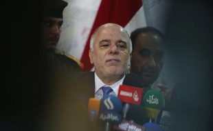 Le Premier ministre irakien Haidar al-Abadi lors d'une conférence de presse à Kerbala le 23 octobre 2014
