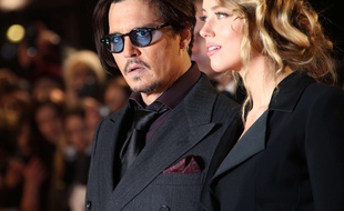 Actor Johnny Depp and Amber Heard pose for photographers upon arrival at the premiere of the film Mortdecai, in London, Monday, Jan. 19, 2015. (Photo by Joel Ryan/Invision/AP)/LENT101/529546068320/011915110197, 21334631/1501200038