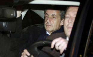 L'ancien président Nicolas Sarkozy quitte le pôle financier à Paris, le 16 février 2016, après sa mise en examen pour financement illégal de sa campagne présidentielle de 2012