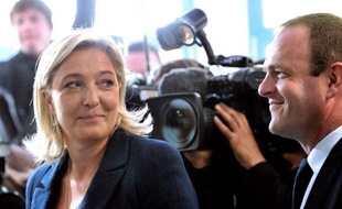 Marine Le Pen, la présidente du FN, battue à Hénin-Beaumont, a assuré lundi sur France Info que "la recomposition politique est bel et bien là", au vu du résultat des candidats de sa mouvance dimanche, malgré les consignes de l'UMP.