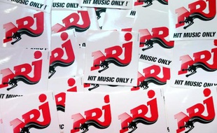 La radio NRJ vise 13% d'audience d'ici à un an mais le pôle télé du groupe NRJ (NRJ 12, Chérie 25) affichera en 2013 des pertes de "moins d'une vingtaine de millions d'euros", déclare au Figaro le PDG du groupe NRJ, Jean-Paul Baudecroux.
