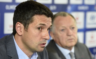 Rémi Garde, ici aux côtés de Jean-Michel Aulas, avait quitté l'OL en mai 2014.