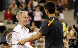 Novak Djokovic et John McEnroe à l'US Open le 7 septembre 2009.
