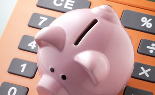 Piggy bank with calculator.