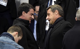Manuel Valls et Nicolas Sarkozy avant la rencontre entre le PSG et l'OL au Stade de France le 19 avril 2014.