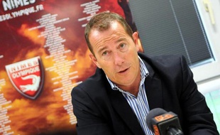 Le président de Nîmes Olympique Jean-Marc Conrad lors d'une conférence de presse au siège du club, le 7 juillet 2014