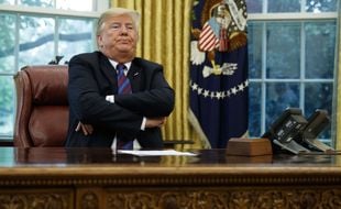 Donald Trump, les bras croisés dans le bureau ovale de la Maison Blanche, le 27 août 2018.