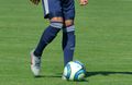 Photo d'illustration d'un jeune footballeur à l'entraînement. 