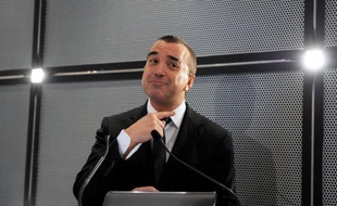French media group Lagardere Chief Executive Arnaud Lagardere gestures while speaking during a press conference to present the group's 2012 results on March 7, 2013 at Lagardere Active headquarters in Levallois-Perret, near Paris. AFP PHOTO ERIC PIERMONT