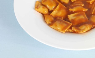 Illustration d'une assiette de raviolis.