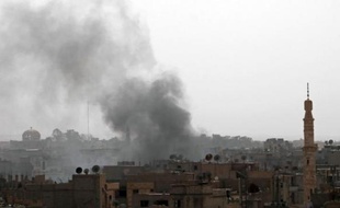 L'armée syrienne bombardait vendredi le quartier de Qaboun, dans l'est de la capitale, pour tenter d'en déloger les rebelles, a rapporté une ONG syrienne.