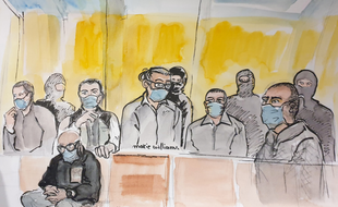 Ali Riza Polat, à droite, écoute l'énoncé du verdict du procès des attentats de janvier 2015
