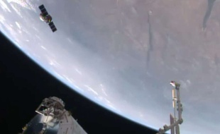 Photographie diffusée par NASA-TV de la capsule non habitée Cygnus, qui vient de se détacher de la Station spatiale internationale (ISS), à laquelle elle était amarrée depuis près d'un mois.