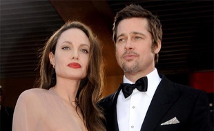 Angelina Jolie et Brad Pitt arrivent pour la projection de "Inglourious Basterds" lors du Festival de Cannes, le 20 mai 2009.