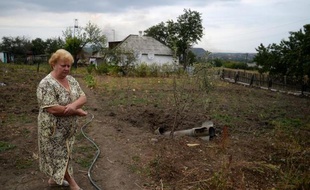 Une habitante de Troïtsko-Khartsizk en Ukraine, le 28 août 2014