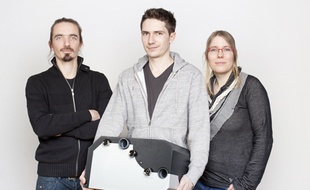 Léquipe de EHTech et sa Obox qui récupère la chaleur des douches.