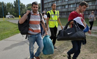 Des migrants syriens arrivent à Gabcikovo, en Slovaquie, le 17 septembre 2015