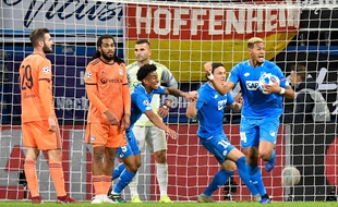 En égalisant en toute fin de partie, l'attaquant brésilien d'Hoffenheim Joelinton a empêché Tousart, Denayer et Lopes de réaliser un véritable hold-up en Allemagne (3-3). THOMAS KIENZLE