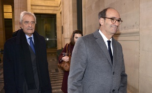 Eric Woerth et son avocat Jean-Yves Le Borgne. AFP PHOTO / JEAN-PIERRE MULLER