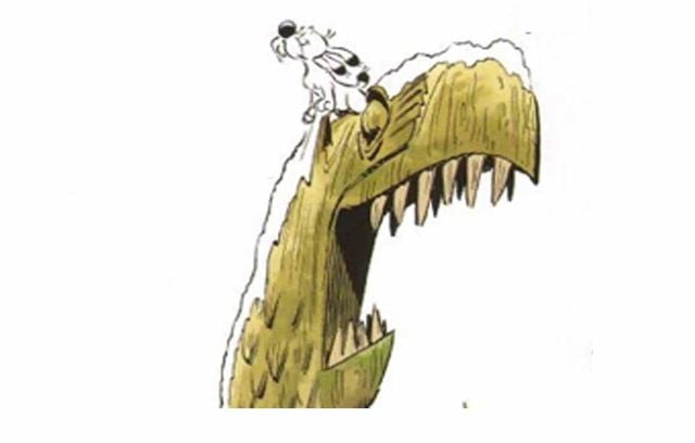 Idéfix sur une sculpture de bois… De la neige… « Astérix chez les Vikings » ?