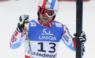 Le Français David Poisson s'est paré du bronze --le premier podium de sa carrière-- dans la descente des Mondiaux de ski alpin, derrière le Norvégien Aksel Lund Svindal et l'Italien Dominik Paris, samedi à Schladming.
