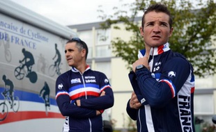 Thomas Voeckler et Laurent Jalabert (au second plan), après un entraînement à Valkenburg (Pays-Bas) le 18 septembre 2012.
