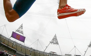 Benjamin Compaoré lors des qualifications du triple saut, aux JO de Londres.