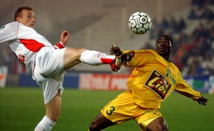 Shiva Star N'Zigou face au Nancéien Sébastien Puygrenier (avec des cheveux) en 2003.