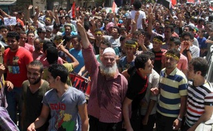 Des partisans des Frères musulmans manifestent au Caire, un an jour pour jour après la destitution par l'armée du président islamiste Mohamed Morsi, le 3 juillet 2014