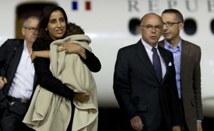 Assia et sa maman sont rentrées en France dans la nuit de mardi à mercredi. AFP PHOTO / KENZO TRIBOUILLARD
