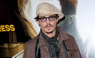 Johnny Depp à Paris pour la promo du film «Rhum Express», le 8 novembre 2011.