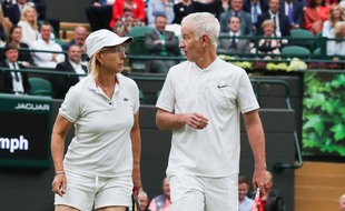 John McEnroe et Martina Navratilova, lors d'un double à Wimbledon.
