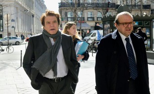 Bernard Tapie et son avocat Hervé Temime à leur arrivée au pôle financier le 12 mars 2015 à Paris