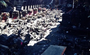 Photo transmise par les services du NTSB le 11 juillet 2013, du Boeing d'Asiana à l'aéroport de San Francisco