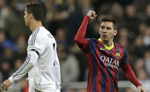 Lionel Messi et Cristiano Ronaldo lors d'un match de Liga, le 23 mars 2014 à Madrid.