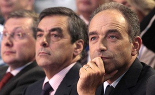 François Fillon (deuxième à gauche) et Jean-François Copé, lors des journées parlementaires de l'UMP à Marcq-en-Baroeul, le 27 septembre 2012.