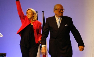French far-right National Front party leader Marine Le Pen, left, waves to supporters with her father Jean-Marie Le Pen, France's far right National Front party honorary president, during a meeting as part of the up coming European elections, in Marseille, southern France, Tuesday, May 20, 2014. The National Front, which also wants to unravel the European Union and withdraw France from the euro currency, hopes to win up to 20 of France's 74 European Parliament seats in the Sunday, May 25 vote. (AP Photo/Claude Paris)/MAR105/346987068080/1405202211