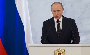 Le président russe, Vladimir Poutine, lors de son adresse annuelle devant les parlementaires, le gouvernement et les gouverneurs des régions de Russie, au Kremlin à Moscou, le 3 décembre 2015.
