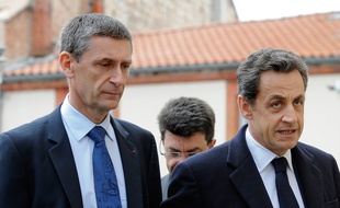 (FILES) A picture taken on March 21, 2012, in Toulouse, southwestern France, shows then France's President Nicolas Sarkozy (R) and General Director of National Police (DGPN) Frederic Pechenard arriving at the Perignon barraks to visit the two officers of the RAID police special forces unit injured today when the RAID tried to storm a self-declared Islamist gunman holed up his apartment in Toulouse, Mohamed Merah. Merah's killing spree claimed seven livesbefore been killed during the assault of his flat. Pechenard, UMP right-wing party member, will lead Sarkozy's campaign for the UMP presidency next november. Sarkozy, 59, announced his return on September 19, 2014 on Facebook after months of speculation, setting the scene for a battle among leading centre-right opposition figures for the 2017 general election end-game as they try and put behind in-fighting and scandals that have torn the UMP party apart. AFP PHOTO /JEAN-PIERRE MULLER