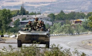 "Le retrait complet dépend de la politique de Saakachvili et de l'action de ses forces", a ajouté le représentant permanent russe à l'Otan. "Nous voulons terminer ce cauchemar le plus tôt possible".