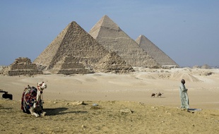 April 2008- Cairo, Egypt- A local man performs his afternoon prayers at The Pyramids of Giza, the sole survivor of the Seven Wonders of the Ancient World. Scenes from daily life in Egypt. Photo Credit: Erik Sumption/Sipa Press/0805131635