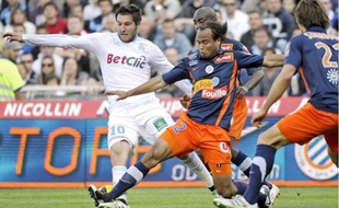 Pour André Ayew, Garry Bocaly (au c.) est devenu « un des piliers de Montpellier».