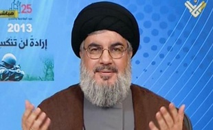 Le chef du mouvement chiite libanais Hezbollah Hassan Nasrallah a promis samedi à ses partisans la victoire dans la guerre en Syrie où son mouvement est engagé aux côtés de l'armée gouvernementale contre les rebelles. +++ RESTRICTED TO EDITORIAL USE - MANDATORY CREDIT "AFP PHOTO / HO / AL-MANAR" - NO MARKETING NO ADVERTISING CAMPAIGNS - DISTRIBUTED AS A SERVICE TO CLIENTS +++
