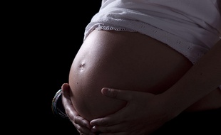 Une femme enceinte. Illustration.