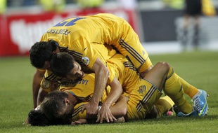 Les joueurs de l'équipe d'Ukraine, fêtant un but contre le Montenegro, le 7 juin 2013 à Podgorica.