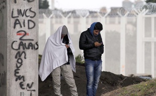 Des migrants dans le camp de Calais dit «La Jungle», le 21 octobre 2015